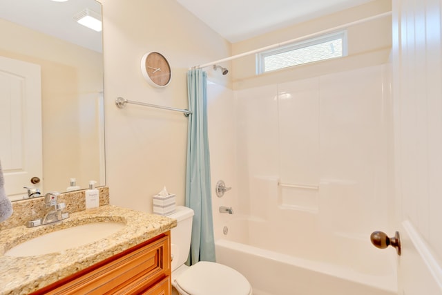 full bath with vanity, toilet, and shower / bath combo with shower curtain