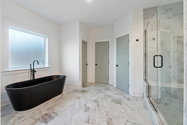 9891 Trestle Cir Unit 48, Ooltewah, TN 37363 - bathroom with a soaking tub, a stall shower, and marble finish flooring