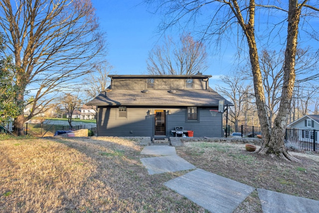 view of front of property with fence