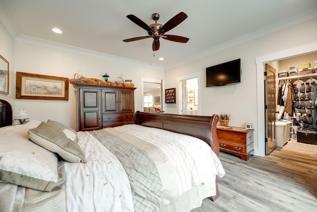 bedroom with light wood-type flooring, crown molding, and recessed lighting