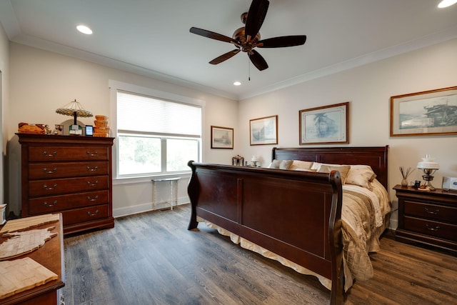 bedroom featuring dark wood-style floors, recessed lighting, and crown molding