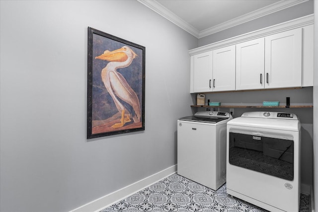 clothes washing area featuring baseboards, light tile patterned flooring, cabinet space, crown molding, and washing machine and dryer