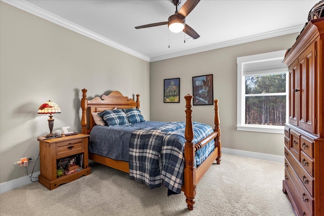 bedroom featuring ceiling fan, light carpet, baseboards, and ornamental molding