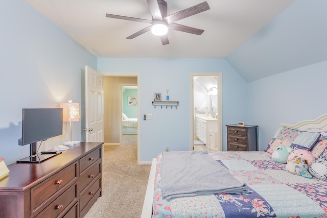 bedroom featuring lofted ceiling, light colored carpet, connected bathroom, ceiling fan, and baseboards