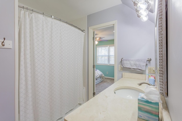 bathroom with ceiling fan and vanity