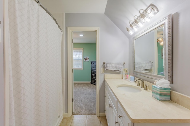 full bath featuring a shower with shower curtain, vanity, and tile patterned floors