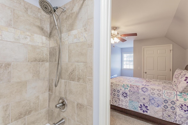 interior space featuring lofted ceiling, ceiling fan, and shower / tub combination