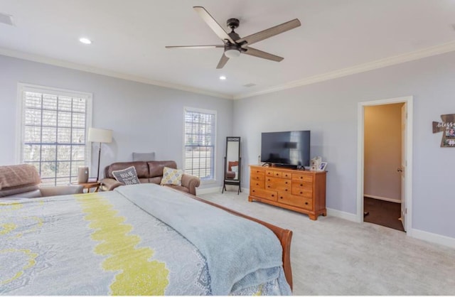 carpeted bedroom with baseboards, ornamental molding, a ceiling fan, and recessed lighting