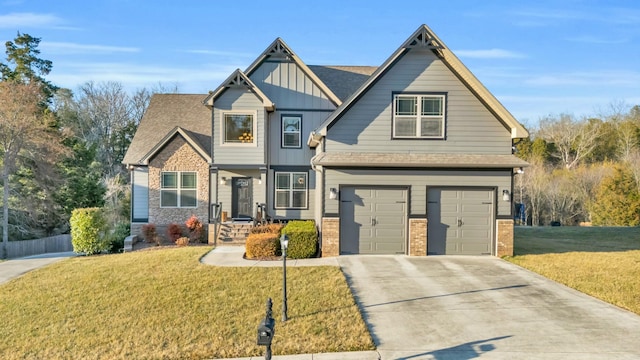 craftsman-style home with brick siding, board and batten siding, a front yard, a garage, and driveway