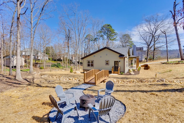 exterior space with an outdoor fire pit