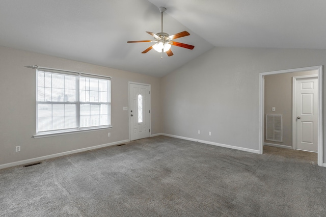 unfurnished living room with lofted ceiling, carpet floors, ceiling fan, and visible vents