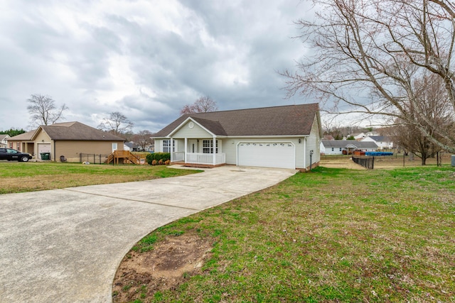 view of front of property featuring covered porch, an attached garage, driveway, and a front lawn