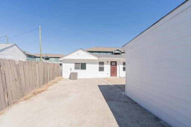 view of patio / terrace with fence and central air condition unit