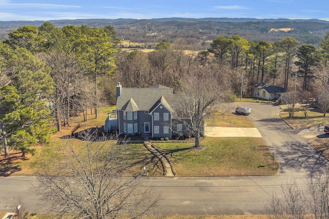 bird's eye view with a view of trees