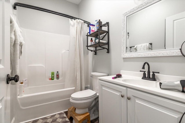 full bathroom with vanity, toilet, and shower / bath combo with shower curtain