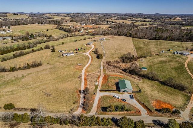 birds eye view of property featuring a rural view