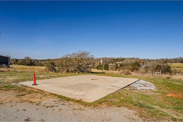 exterior space featuring community basketball court