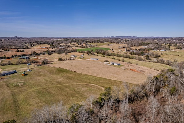 birds eye view of property featuring a rural view