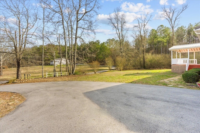 view of yard featuring a view of trees