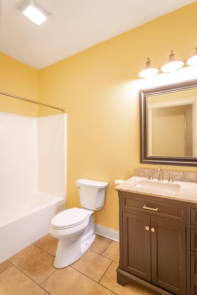 bathroom with visible vents, toilet, vanity, and tile patterned flooring