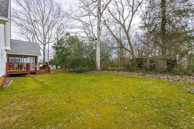 view of yard featuring a deck