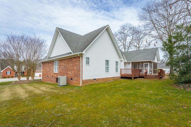 view of home's exterior featuring a lawn, a deck, cooling unit, crawl space, and brick siding