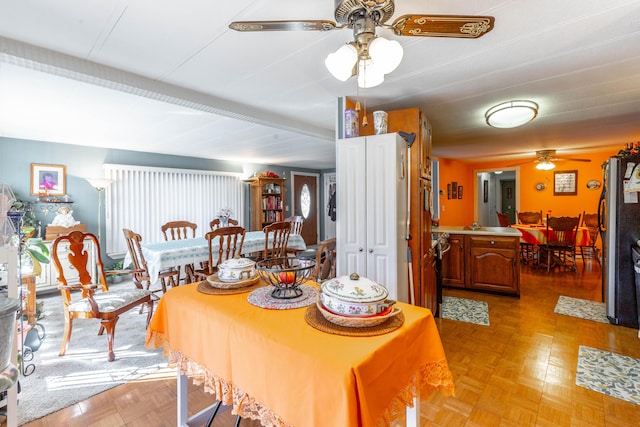 dining area with ceiling fan