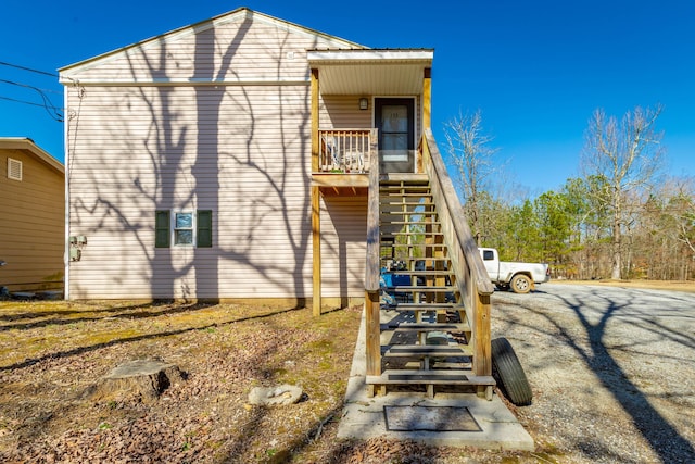 rear view of house with stairway