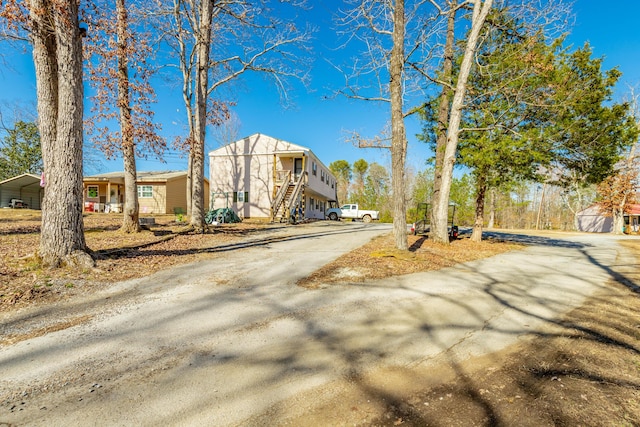 view of street featuring driveway