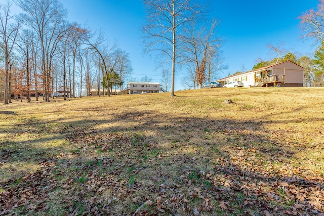 view of yard featuring a deck