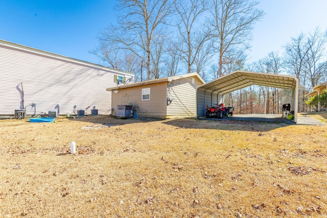 view of home's exterior featuring a carport and cooling unit