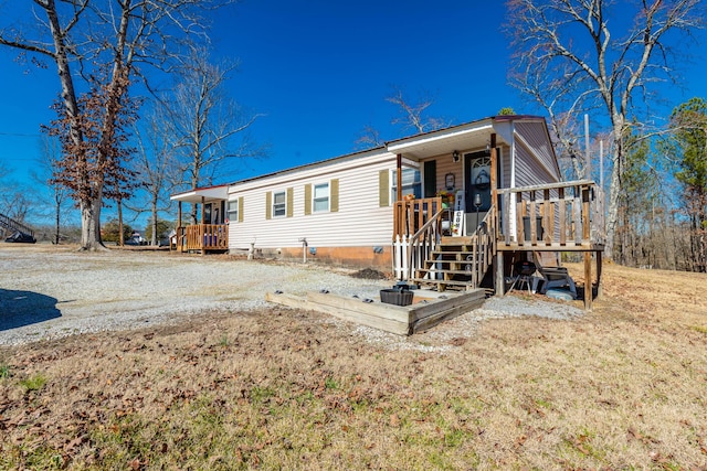 manufactured / mobile home featuring covered porch