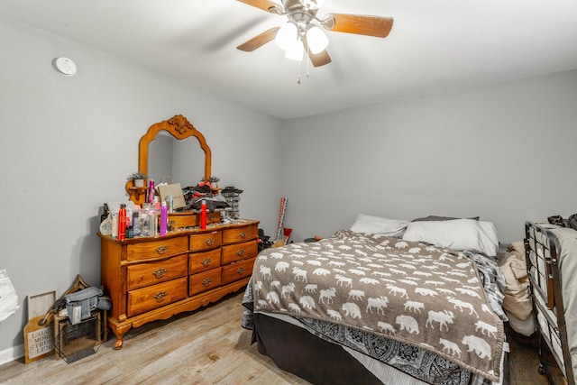 bedroom featuring ceiling fan and light wood-style floors