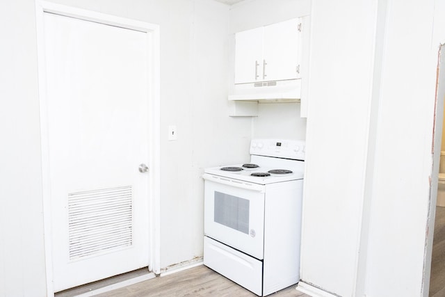 kitchen with visible vents, light wood-style flooring, under cabinet range hood, white cabinetry, and white range with electric cooktop