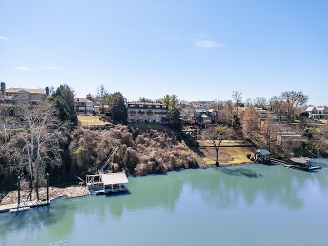 property view of water featuring a floating dock