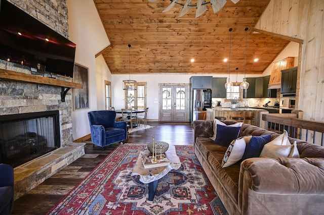 living area with wooden ceiling, a fireplace, high vaulted ceiling, and dark wood-style flooring