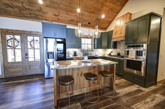 kitchen with lofted ceiling, wood ceiling, light stone counters, stainless steel appliances, and backsplash