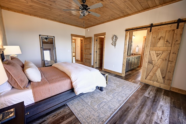 bedroom featuring dark wood-style flooring, crown molding, a barn door, wooden ceiling, and baseboards