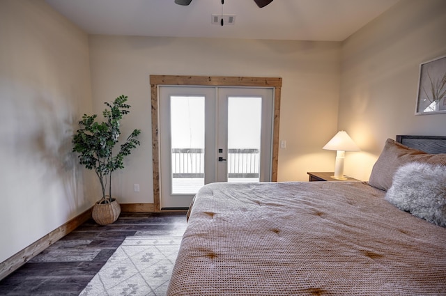 bedroom with access to exterior, french doors, visible vents, wood finished floors, and baseboards