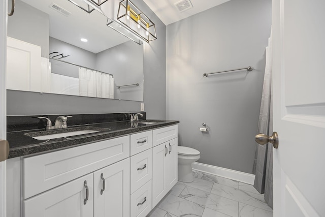 bathroom featuring baseboards, visible vents, marble finish floor, and a sink