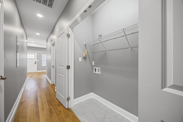 laundry room featuring visible vents, baseboards, laundry area, washer hookup, and marble finish floor