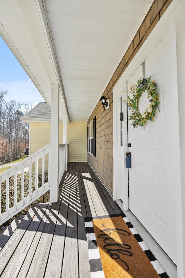 wooden deck featuring a porch