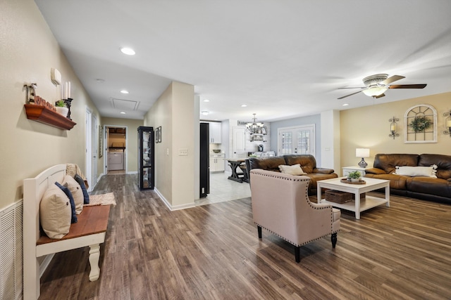 living area with recessed lighting, ceiling fan, baseboards, and wood finished floors