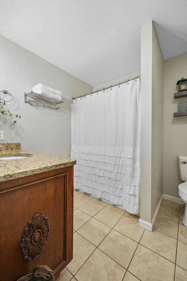 full bath with tile patterned flooring, a shower with shower curtain, vanity, and toilet