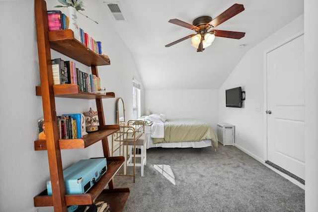 carpeted bedroom featuring visible vents, vaulted ceiling, baseboards, and ceiling fan