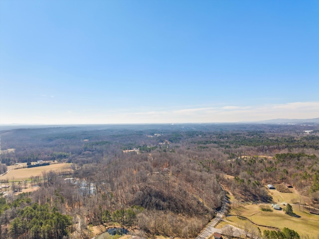 aerial view featuring a forest view