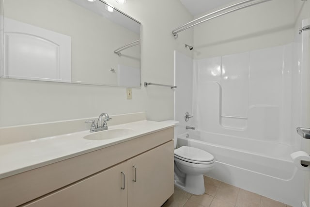 bathroom with toilet, vanity, tub / shower combination, and tile patterned floors