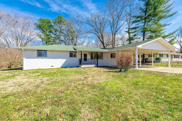 ranch-style home featuring a front lawn, crawl space, covered porch, a carport, and driveway