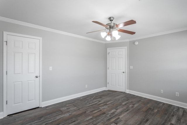 unfurnished room featuring baseboards, dark wood-type flooring, ceiling fan, and crown molding