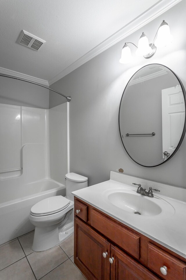 bathroom featuring vanity, visible vents, crown molding, tile patterned floors, and toilet